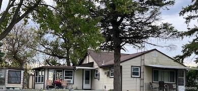 Bungalow-style house with a shingled roof