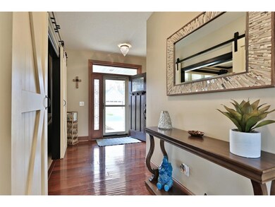 Welcome home!  Grand foyer opens to office with ne