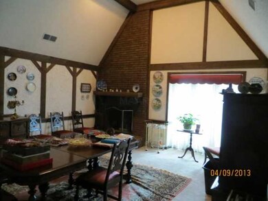 Great room with vaulted ceiling & Fireplace