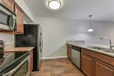 Generous cabinet storage, modern appliances, and a