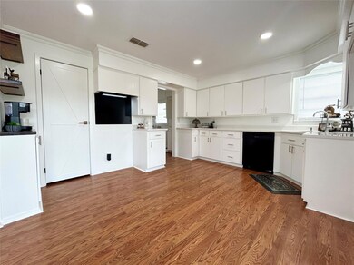 Spacious kitchen with gorgeous quartz countertops