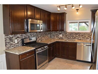 Kitchen. Completely updated kitchen w/ new dark ma
