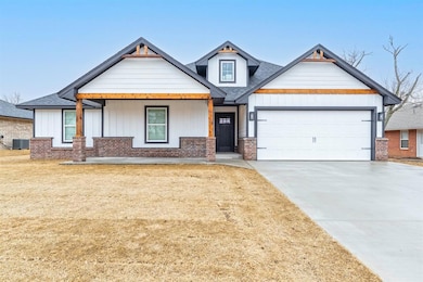 Craftsman inspired home with a garage and central 