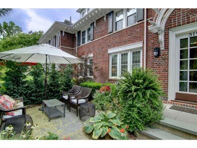 Exterior Front. Blue stone patio at front of house