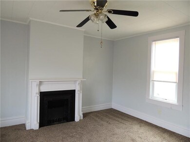 An abundance of natural light floods the spacious 