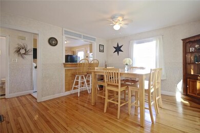 Dining room with hardwood floors.