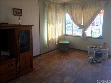 Hardwood floors in living room and bedrooms, needs