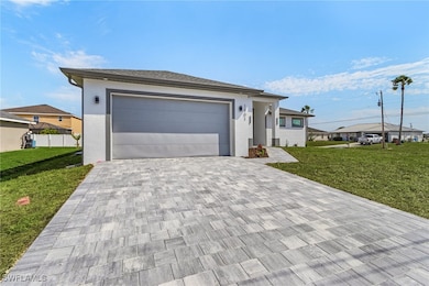 Single story home with stucco siding, a front lawn