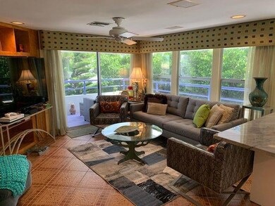 Living Room overlooking wrap-around porch and amaz