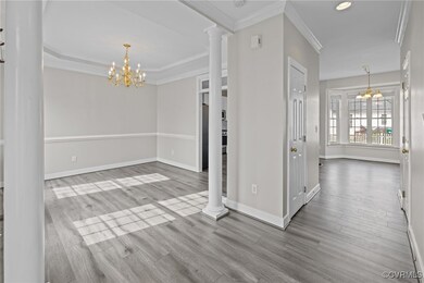 A formal dining room is located to the left of the