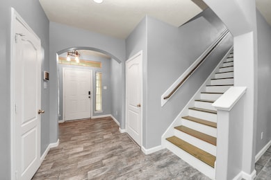 Left door is half bath and right door is garage