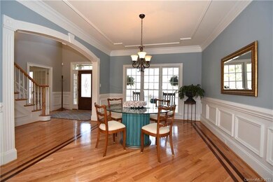 Beautiful view of the formal Dining Room and Entry