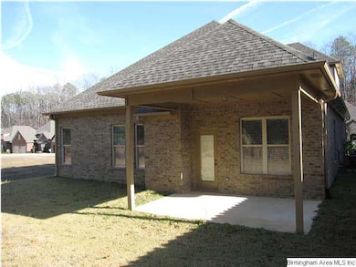 rear of home with large covered porch