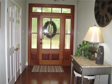 Inviting foyer with swing room/4th bedroom entry
