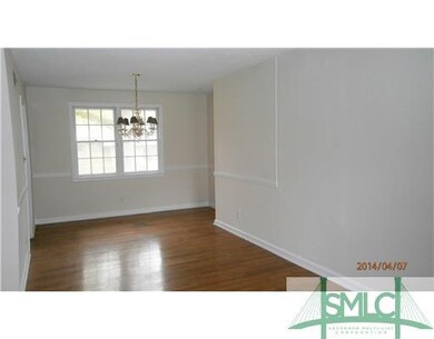 Dining Room. Freshly painted & open to living & ki
