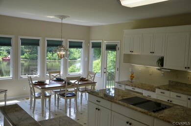 Eat-in Kitchen with granite and newer appliances.
