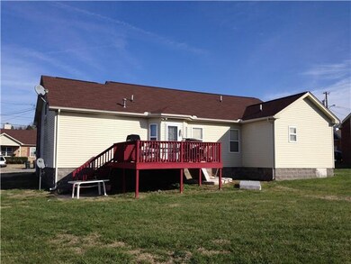 Back view of property. (Please pardon the items - rented for a few years)