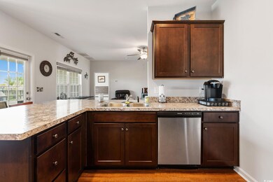 Kitchen featuring sink, stainless steel dishwasher