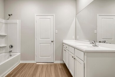 Secondary Bathroom comes with a shower and tub combo