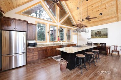Grand Kitchen w/ Granite Counter Island