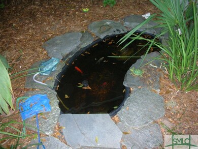 Gold fish pond is a delight for all who visit.