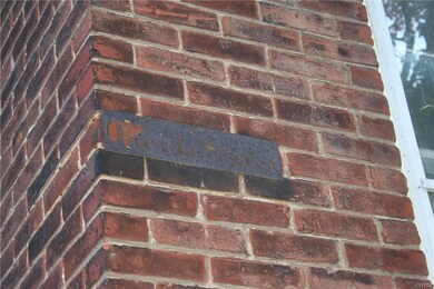 Here is the original name plate on the north side 