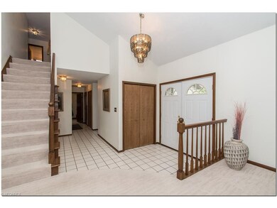 The inviting foyer welcomes you into this well mai