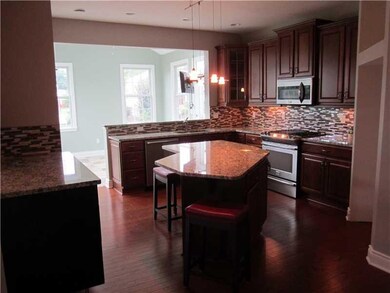 Kitchen. Custom Island, Porcelain Backsplash, Upgr