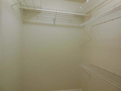 master bedroom with walkin closet