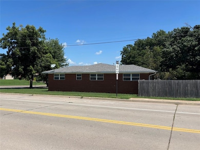 View of property exterior featuring brick siding and crawl space