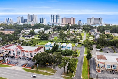 Bird's eye view of city skyline and a nearby body of water