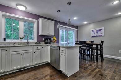 Granite Counters, Hardwood and Wine Fridge with Ba