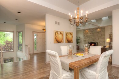 This shot offers a view of the front door, living 
