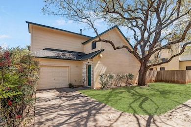View of front of home featuring concrete driveway