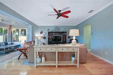 View from kitchen to family room and florida room.