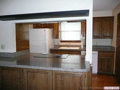 Kitchen has granite, newer appliances and lots of