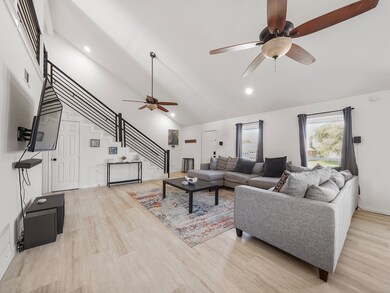 The open-concept main living area seamlessly integ