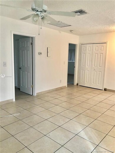 Living room dining room area into both master bedrooms, closet with washer and dryer