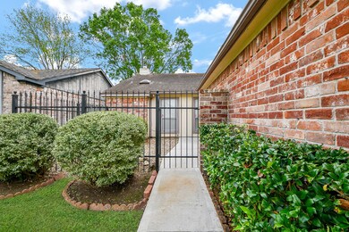 Enjoy added privacy and charm with a gated walkway