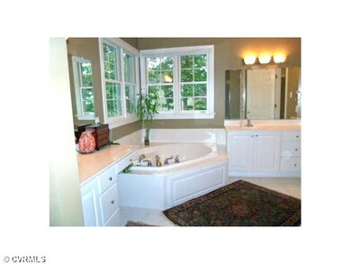 Master Bath - The roomy master bath with a jetted 