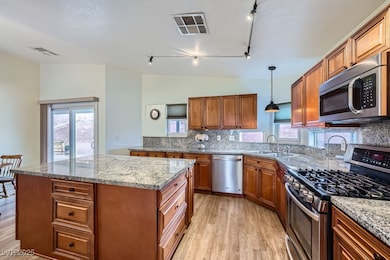 Kitchen featuring light wood-style floors, visible