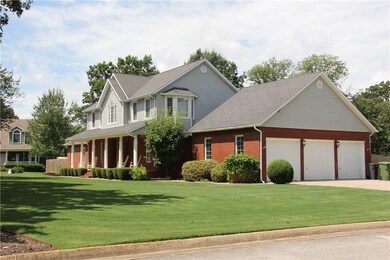 The home features a 3 car garage and is situated o