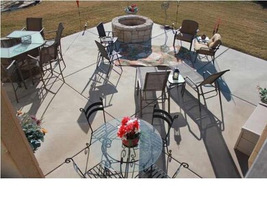 Built in fire pit! View from covered deck.