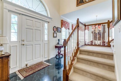 Soaring 2-Story Foyer is elegant and stately!