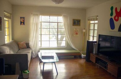 Living area with wood finished floors