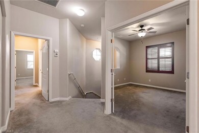 Hall featuring carpet floors
