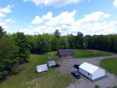 4 aerial showing solar panels house gar