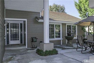 This home has a large front porch complete with fo