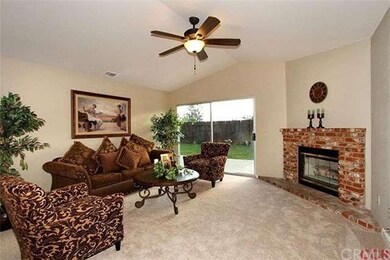 Family Room, fireplace & private back yard