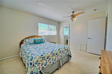 Large bedroom with a walk in closet and tons of na